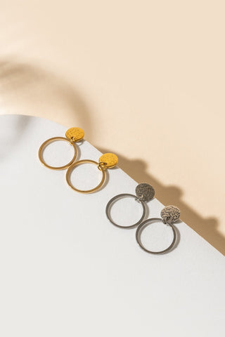 boucle d'oreille avec un rond. or. Montreal designer boutique.