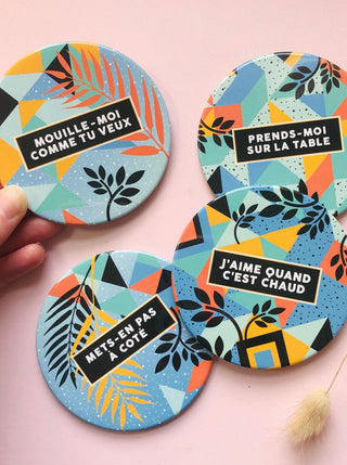 4 sous-verres "coquins" assortis. Inscrit: mouille-moi comme tu veux, etc. Parfait idée cadeau pour femme.