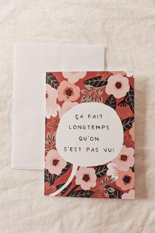 Carte de souhait fleurie écris: ça fait longtemps qu'on s'est pas vu! Parfait pour idée cadeau pour femme.
