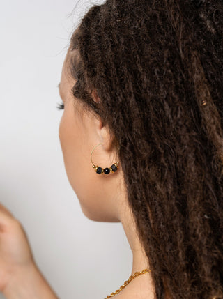 Anneau avec billes noires. Montreal designer boutique.