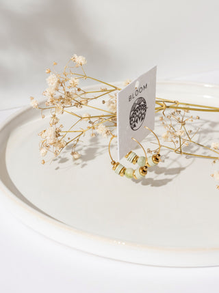 Anneau avec billes vertes. Montreal designer boutique.