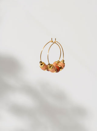 Anneau avec billes roses. Montreal designer boutique.