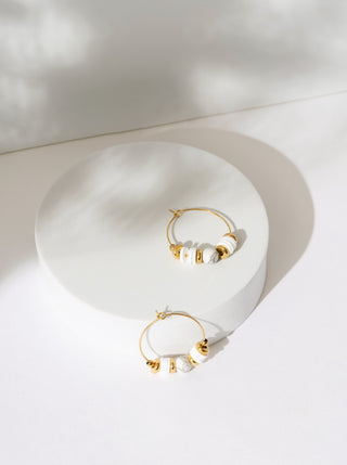 Anneau avec billes blanches. Montreal designer boutique.